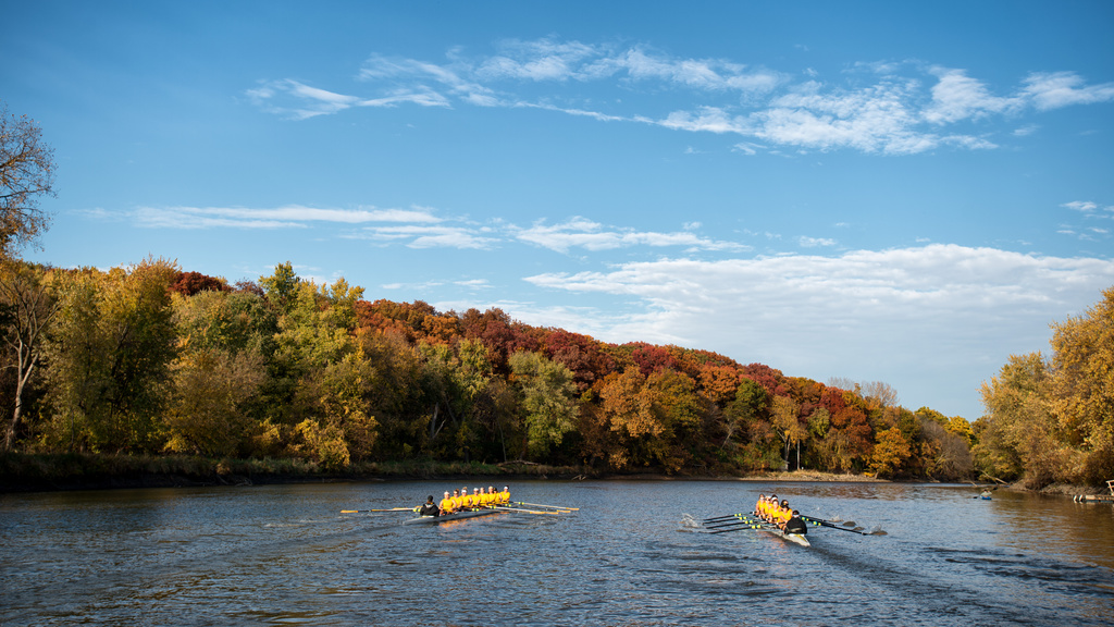 Rowing Team on Iowa River in Fall